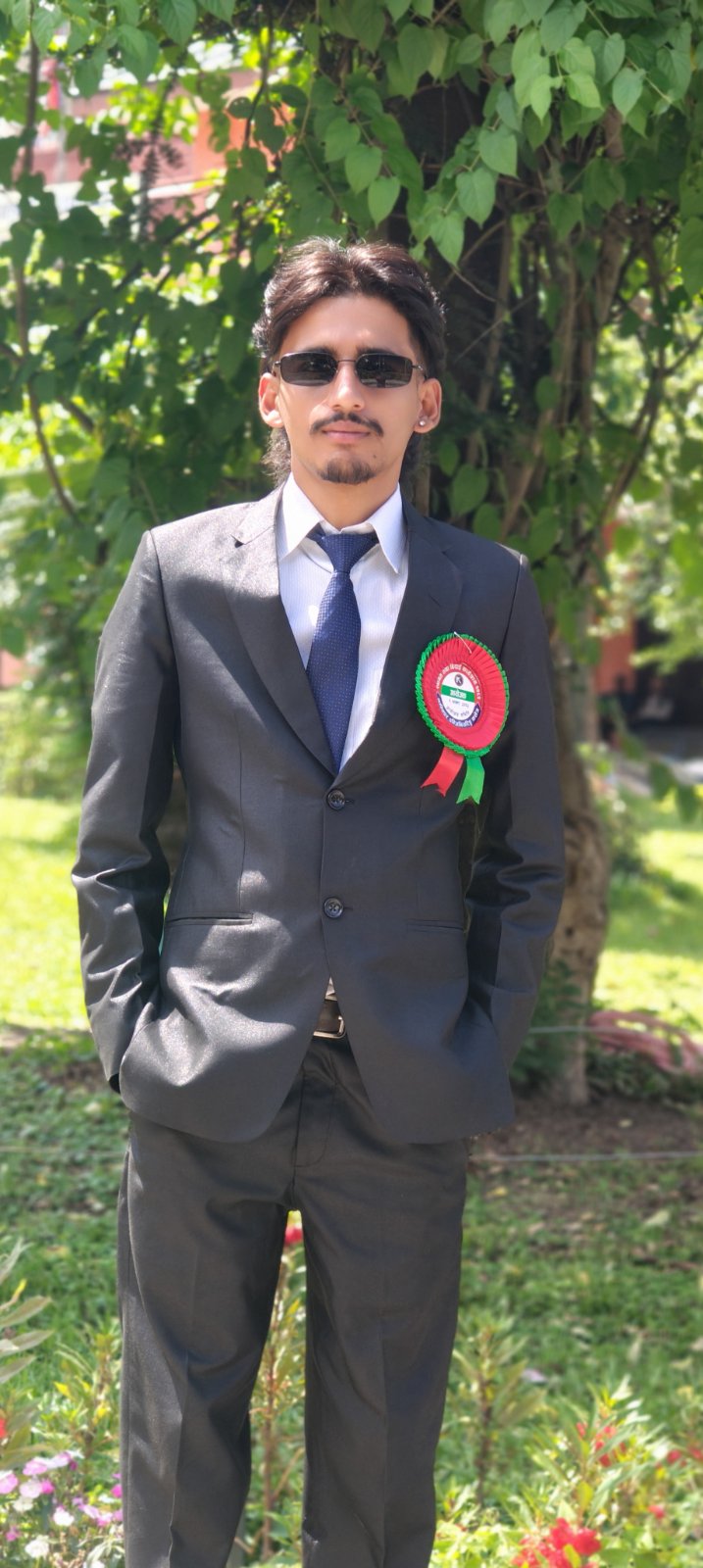Bishal Bikram Paudel wearing a suit